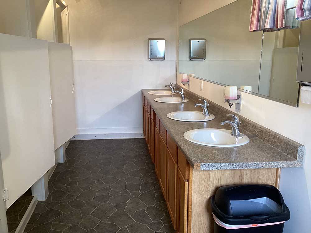 The clean bathroom sinks at RUBY VALLEY CAMPGROUND & RV PARK