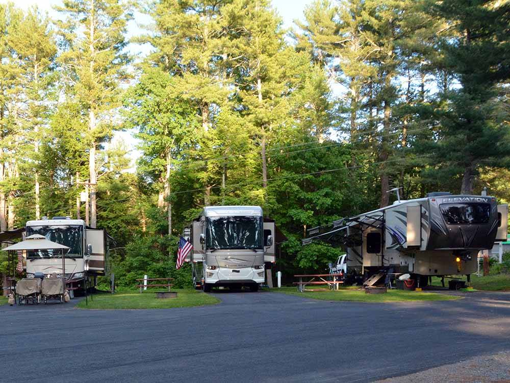 A row of tree lined RV sites at WAKEDA CAMPGROUND
