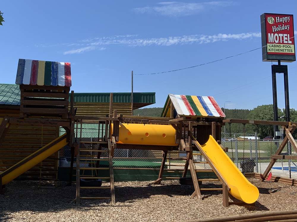 A play structure on the playground at Happy Holiday RV Resort