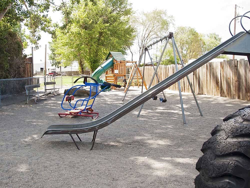 Playground with swing set and slide at MT VIEW RV ON THE OREGON TRAIL