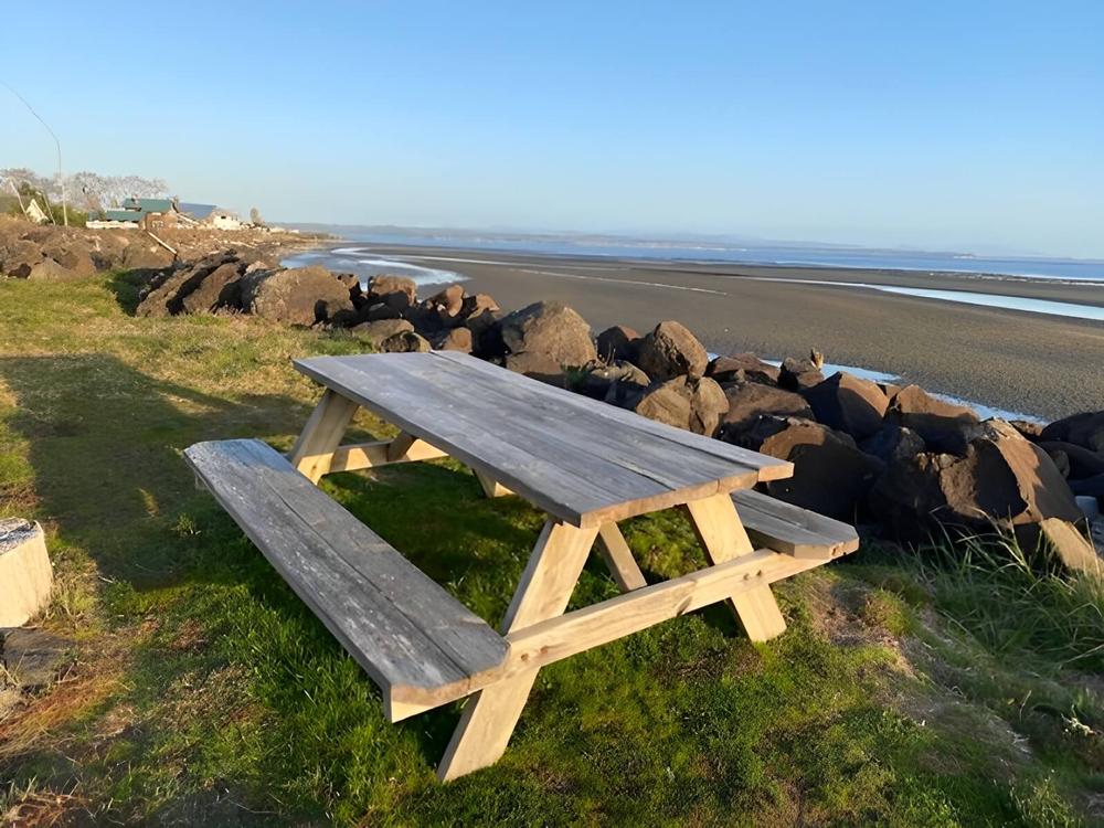 A picnic table by the beach