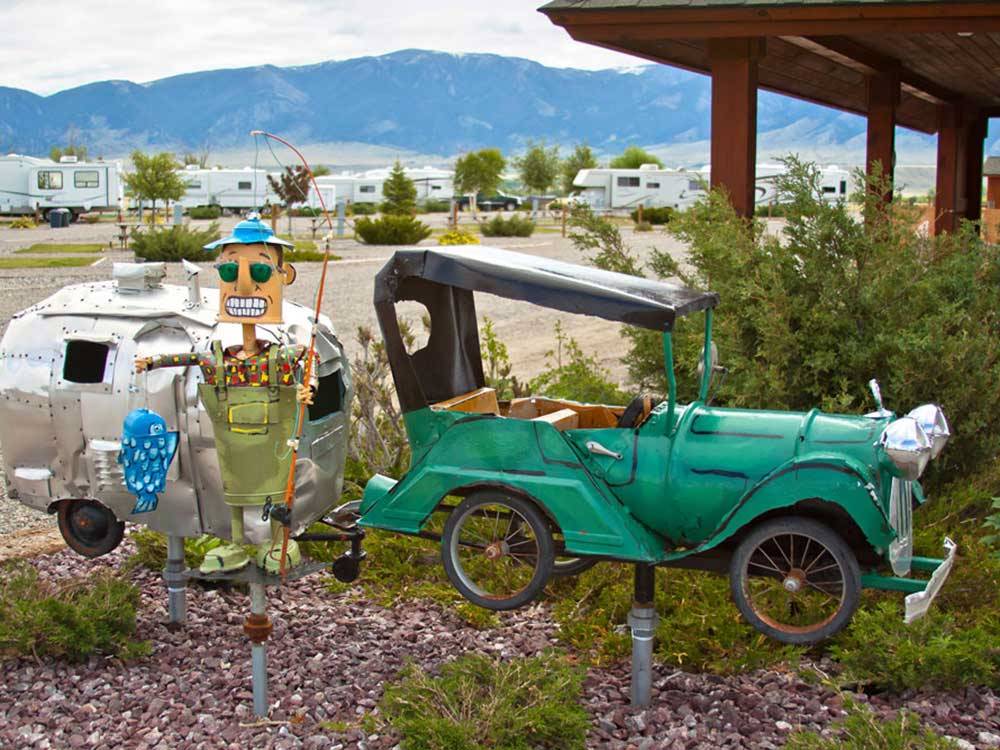 A metal structure of a man and a car at STARRY NIGHT LODGING & RV -ENNIS