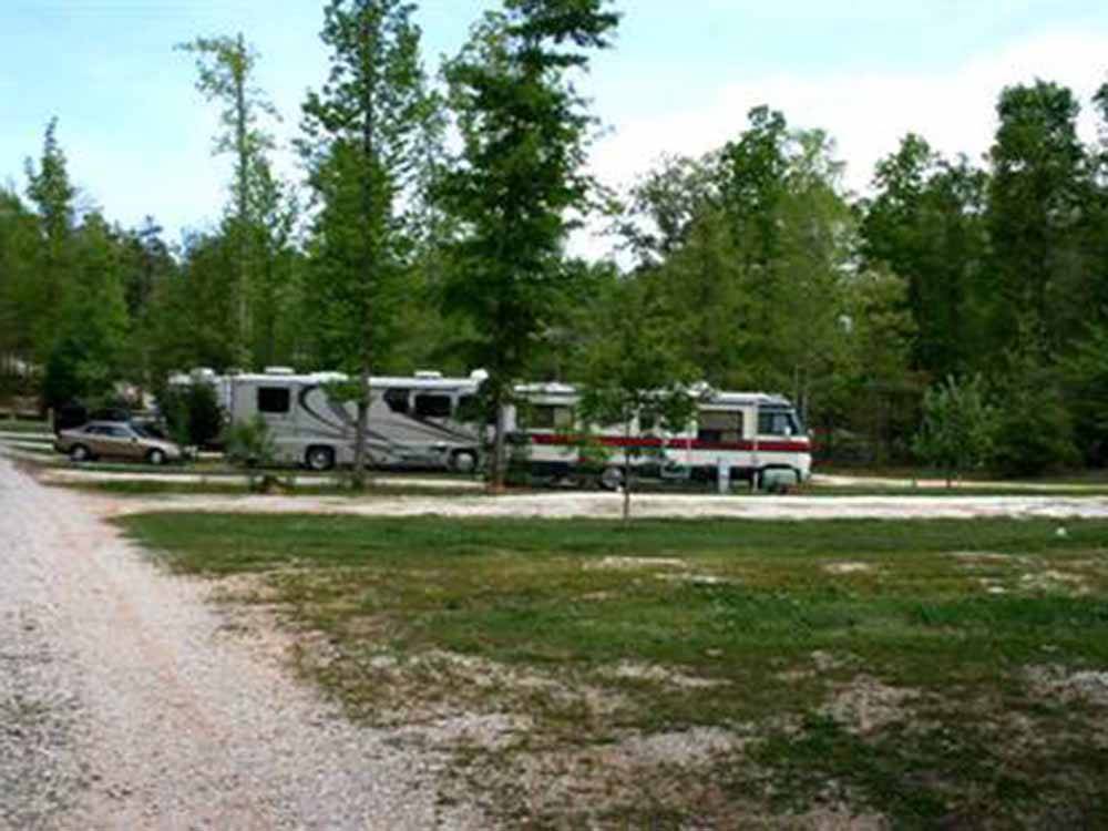 Two motorhomes parked in sites at LAKESIDE RV PARK