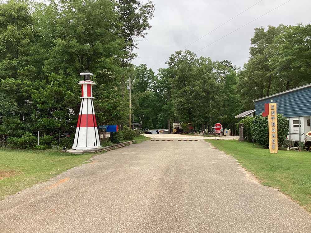 A lighthouse statue next to the entrance at LAKESIDE RV PARK