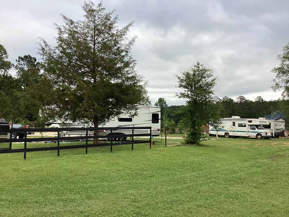 A fifth wheel trailer parked in a site at LAKESIDE RV PARK