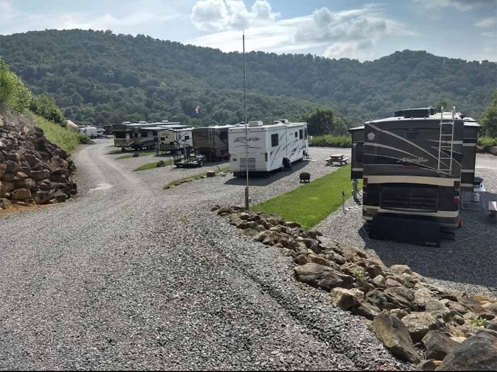 A row of gravel pull thru RV sites at MAMA GERTIE'S HIDEAWAY CAMPGROUND