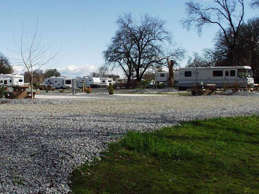 A group of gravel RV sites at JGW RV PARK