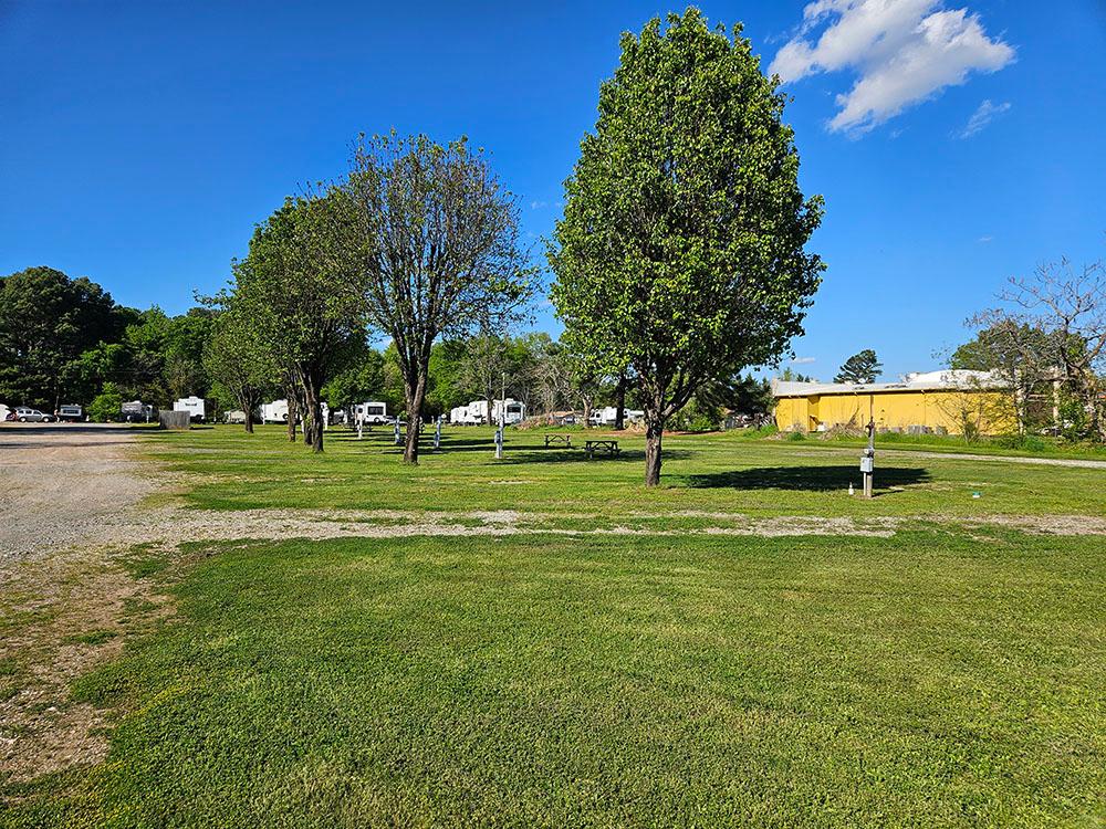 View of tree-lined RV sites at BOBCAT CROSSING RV COMMUNITY