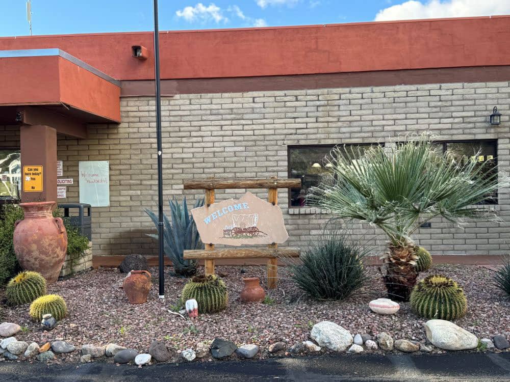 The park sign in front of the office