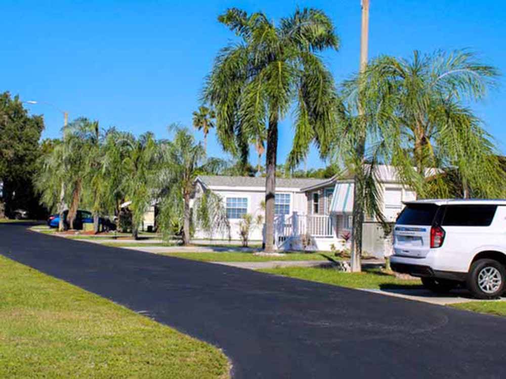 A freshly paved road to the manufactured homes at RAINTREE RV RESORT