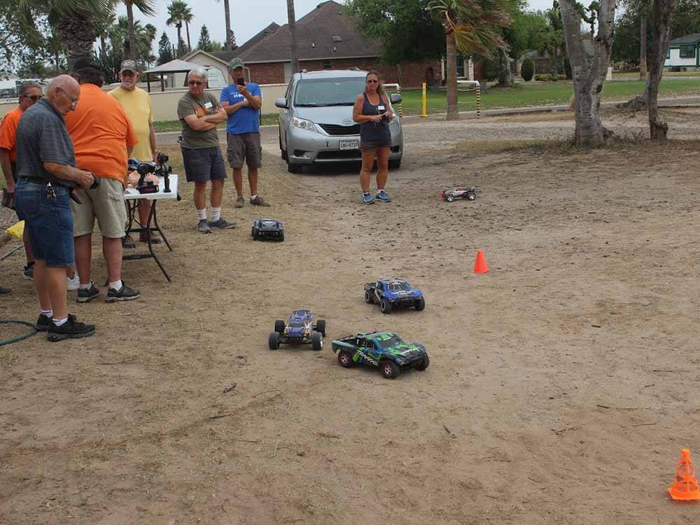 People playing with R/C cars at SEVEN OAKS RESORT