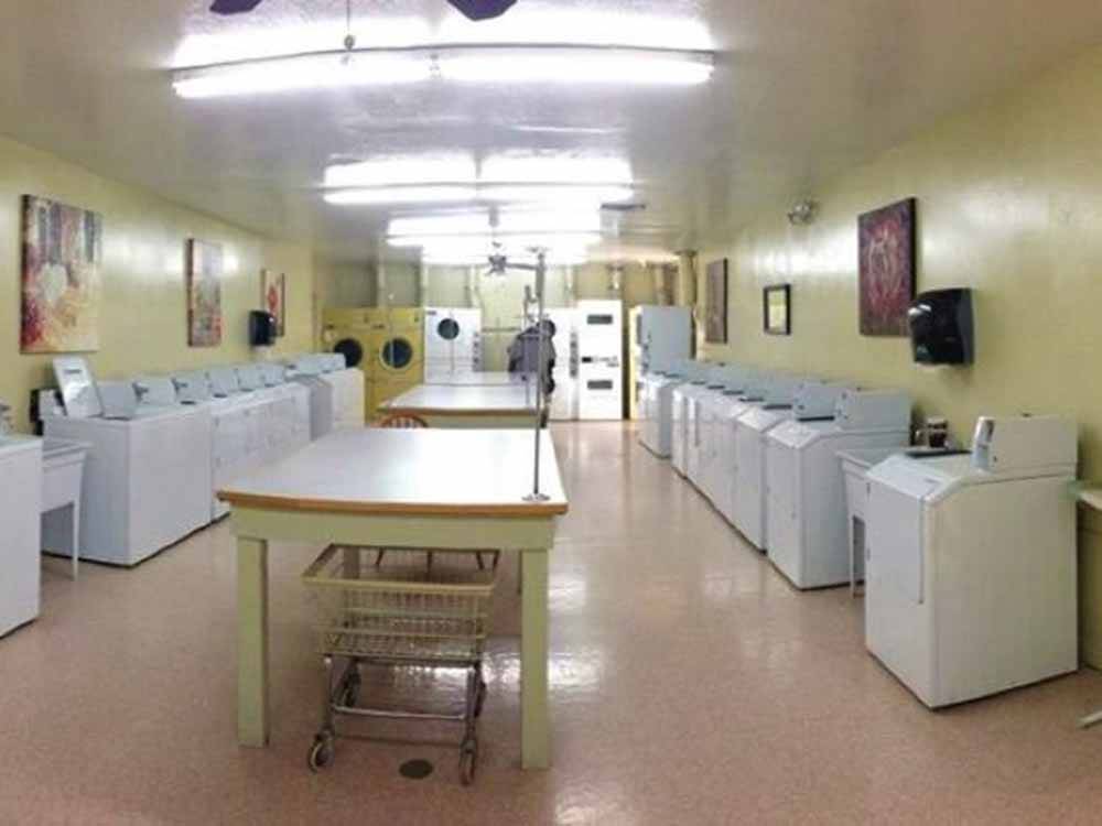 The clean laundry room at DESERT SHADOWS RV RESORT