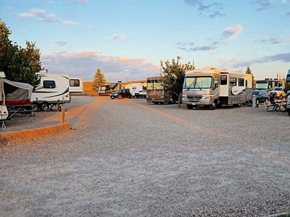 A road between the RV sites at CHEYENNE RV RESORT BY RJOURNEY