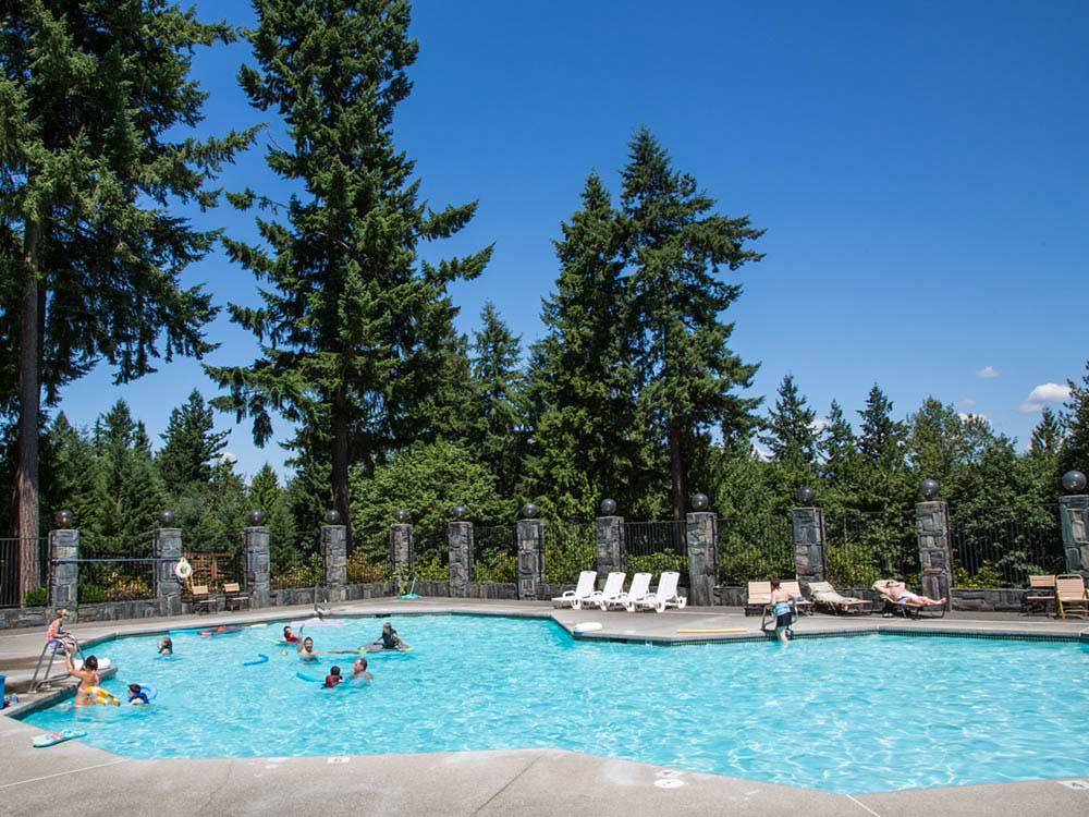 Kids swimming in pool at TALL CHIEF CAMPGROUND
