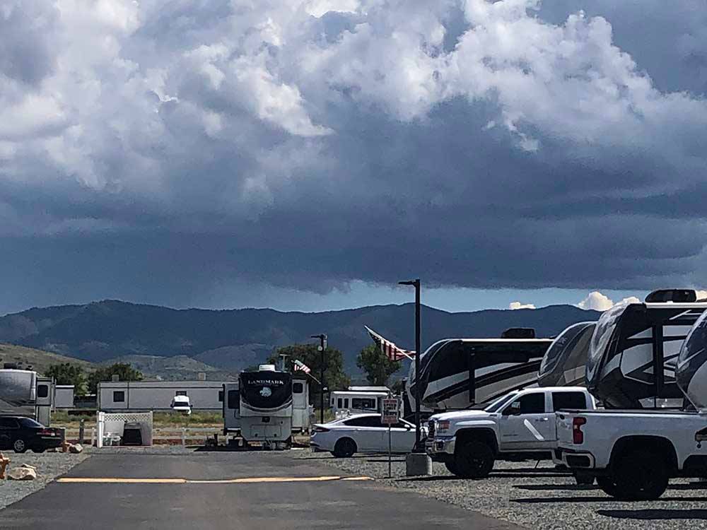 A row of trailers parked in gravel sites at Fairgrounds RV Park