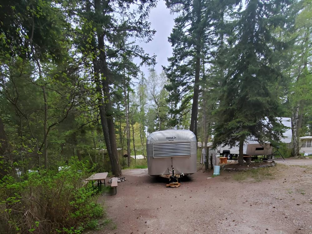Parked travel trailer at Outback Montana RV Park & Campground