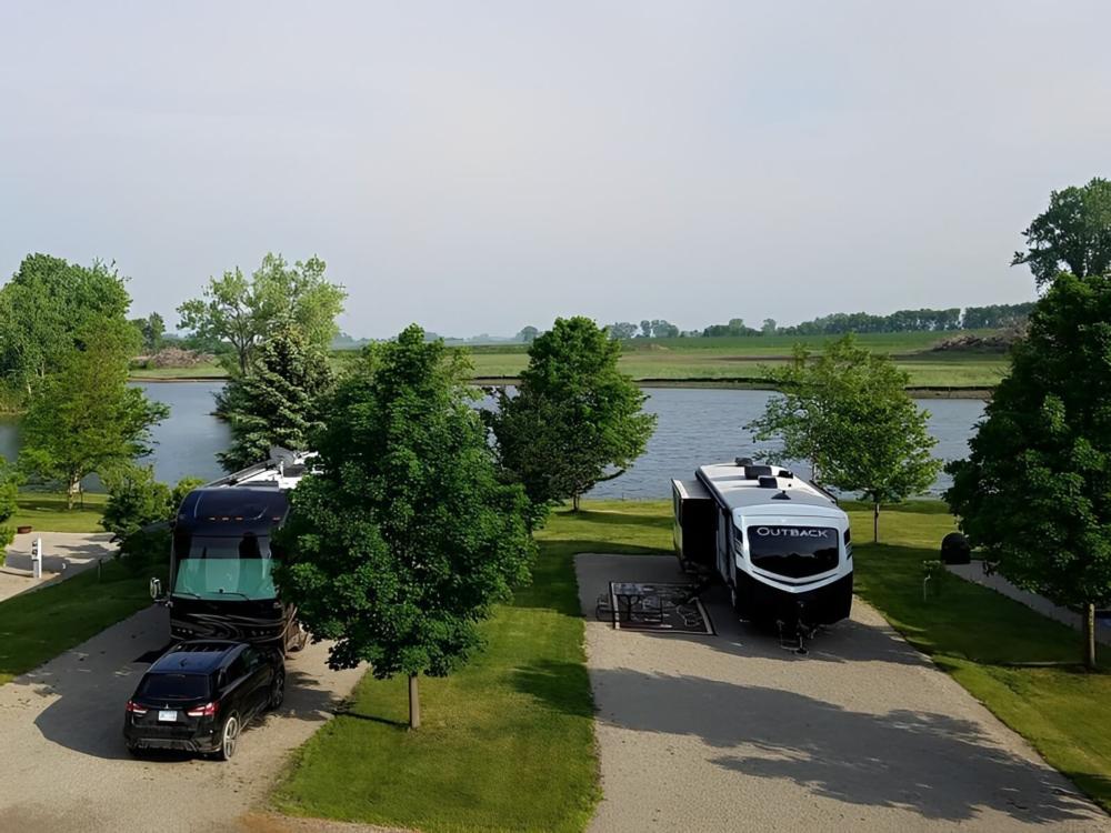 Parked RV and trailer at Crystal Springs RV Resort