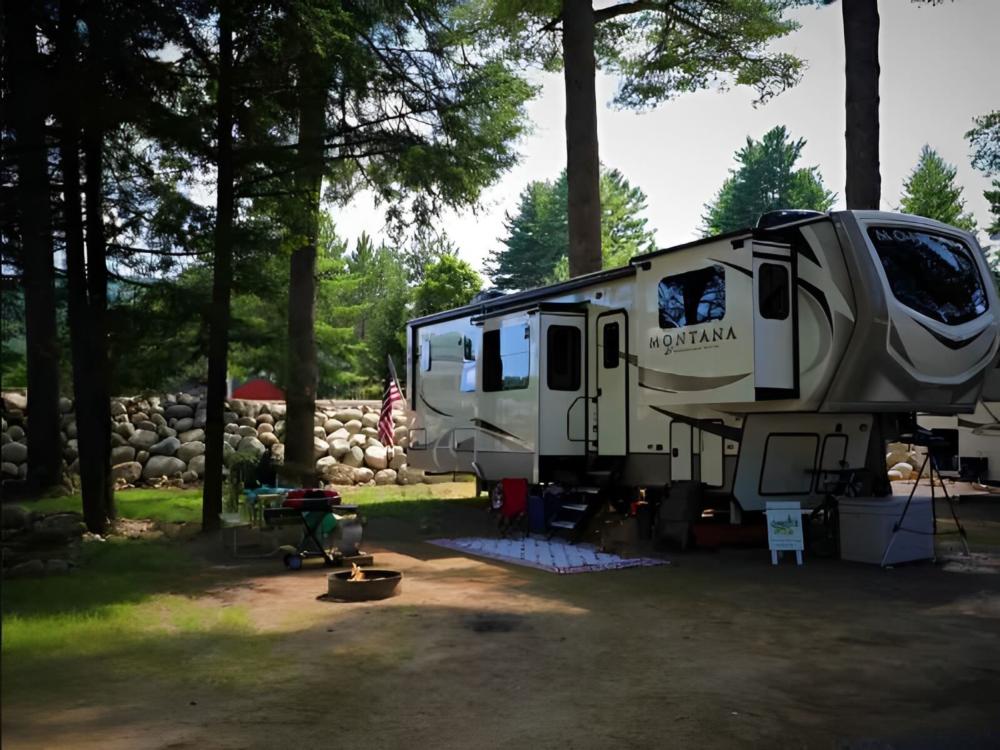 RV site in the trees at Lost Acres RV Park