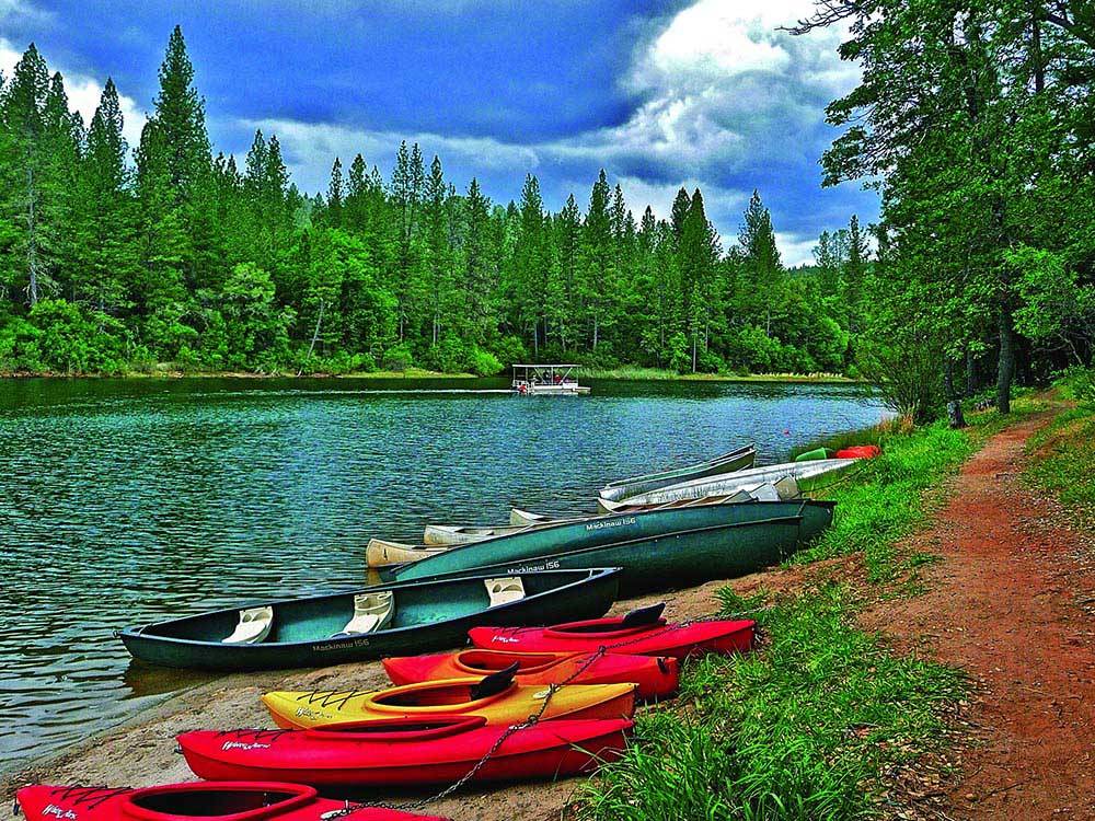 Canoes and kayaks await to be used at THOUSAND TRAILS LAKE OF THE SPRINGS