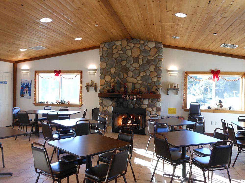 Dining hall with fireplace at THOUSAND TRAILS OAKZANITA SPRINGS