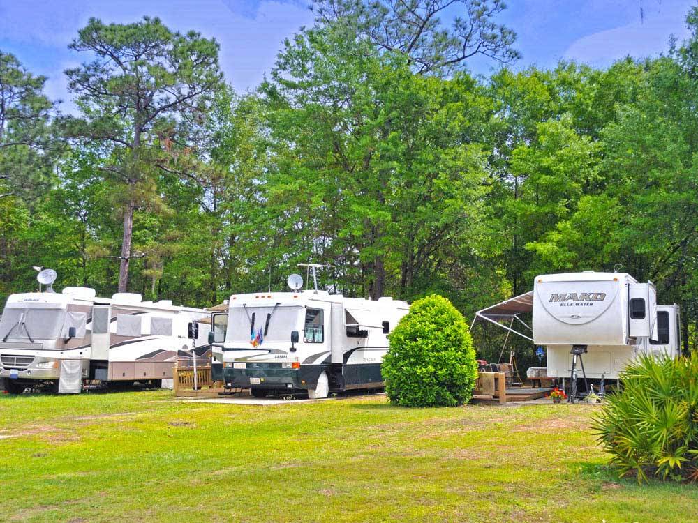 RVs and trailers at campground at THOUSAND TRAILS THREE FLAGS