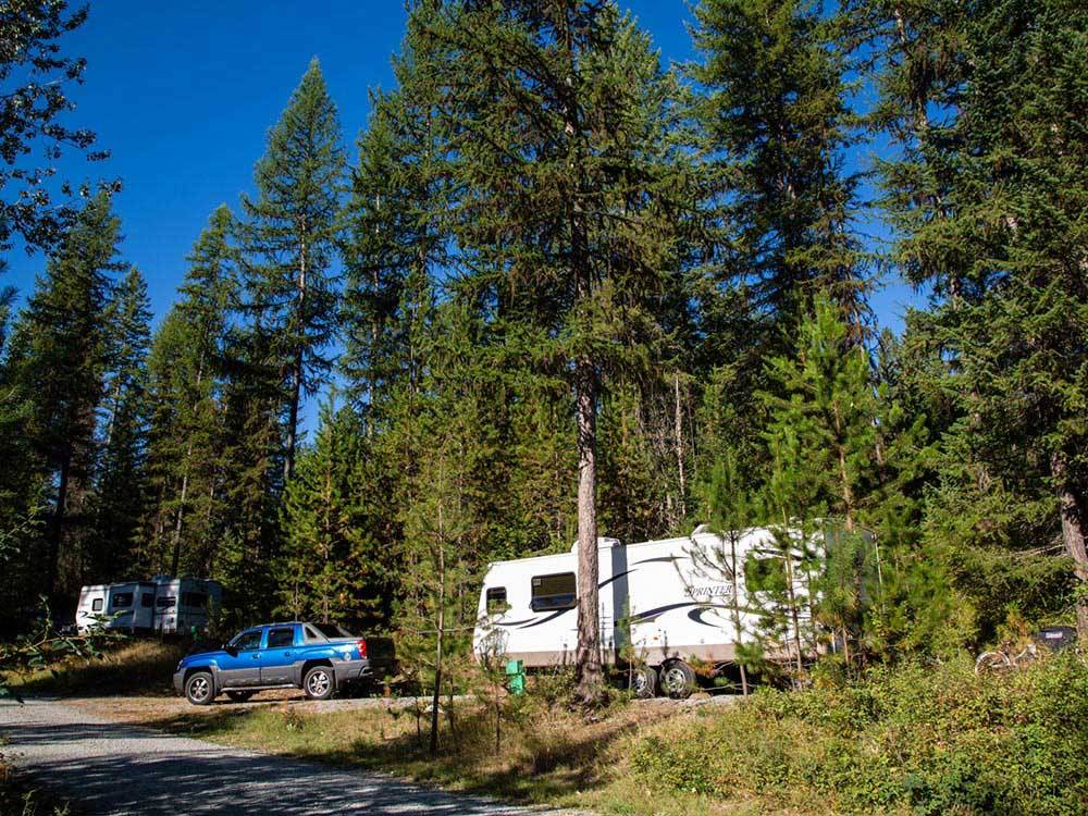 Trailers camping at campsite at THOUSAND TRAILS LITTLE DIAMOND