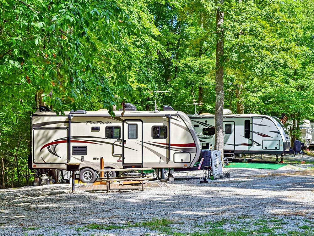 Trailers camping at campsite at THOUSAND TRAILS WILLIAMSBURG