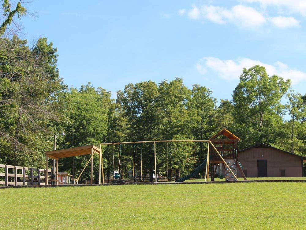 Playground with swing set at THOUSAND TRAILS NATCHEZ TRACE