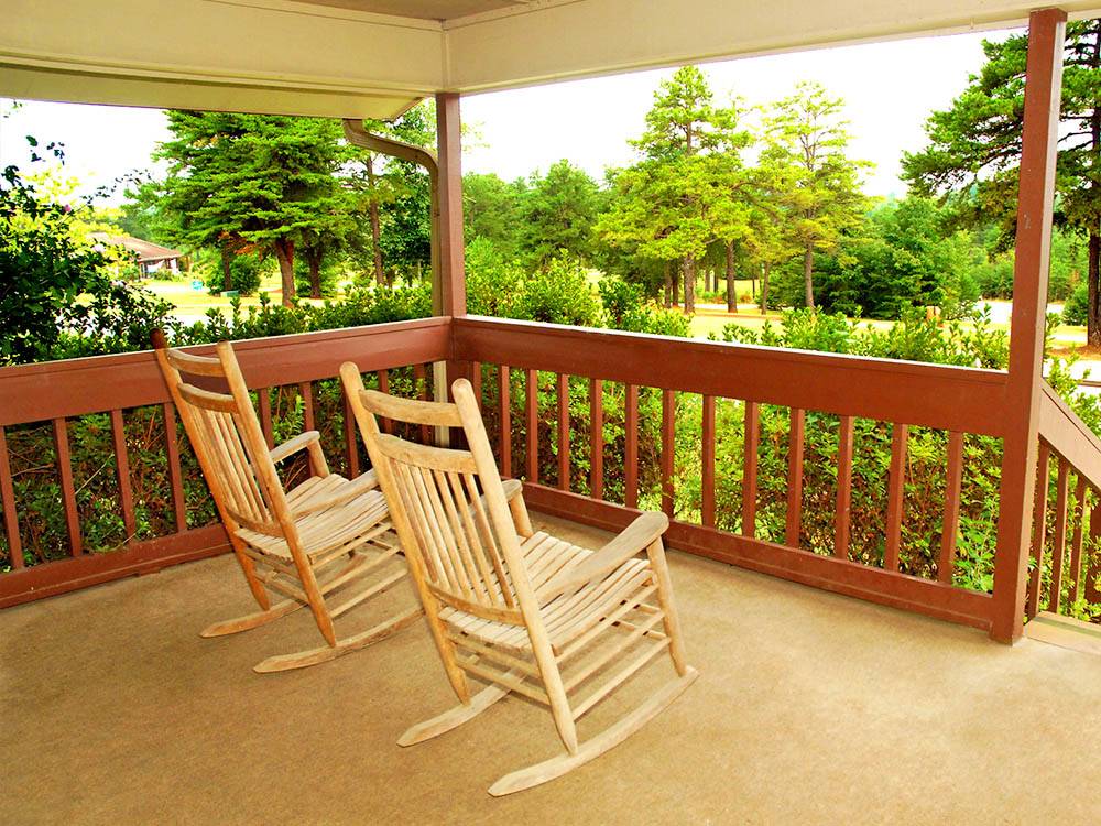 Rocking chairs out on the deck at THOUSAND TRAILS CAROLINA LANDING