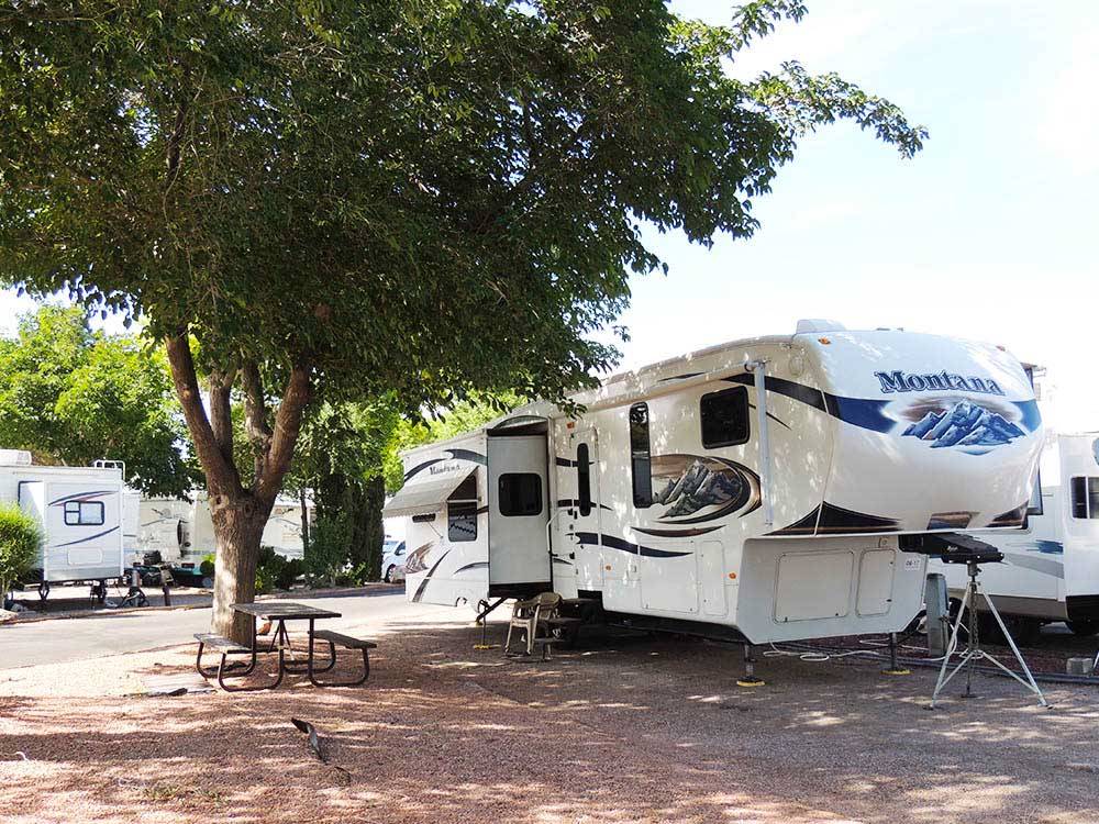 Trailer with picnic table camping at campsite at THOUSAND TRAILS LAS VEGAS