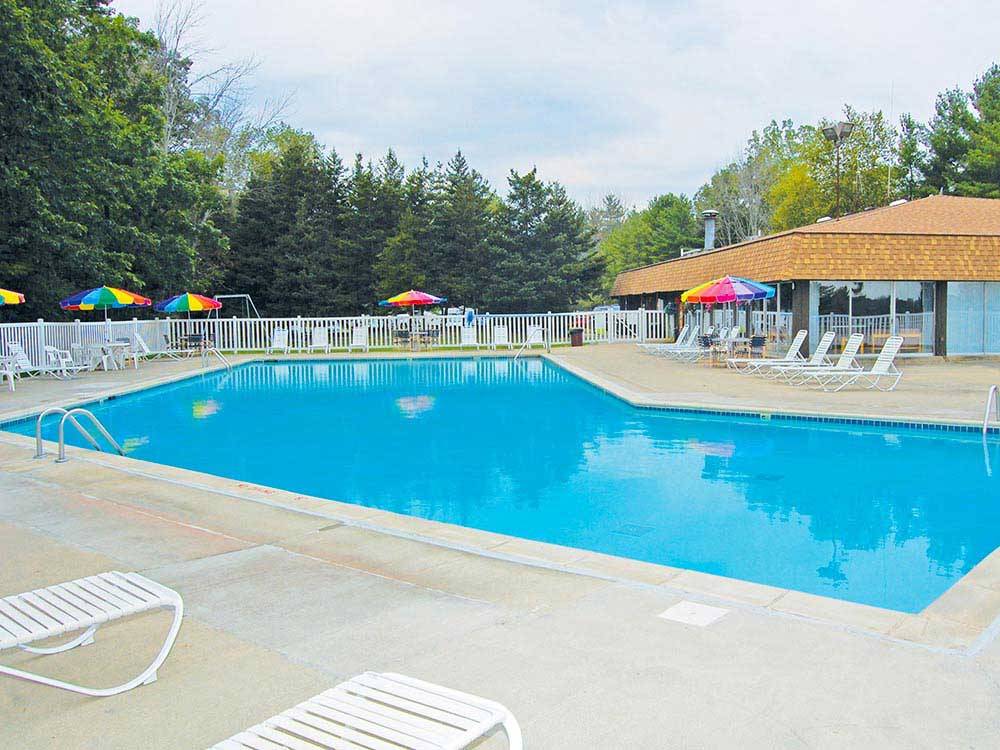 Swimming pool with outdoor seating at THOUSAND TRAILS ST CLAIR