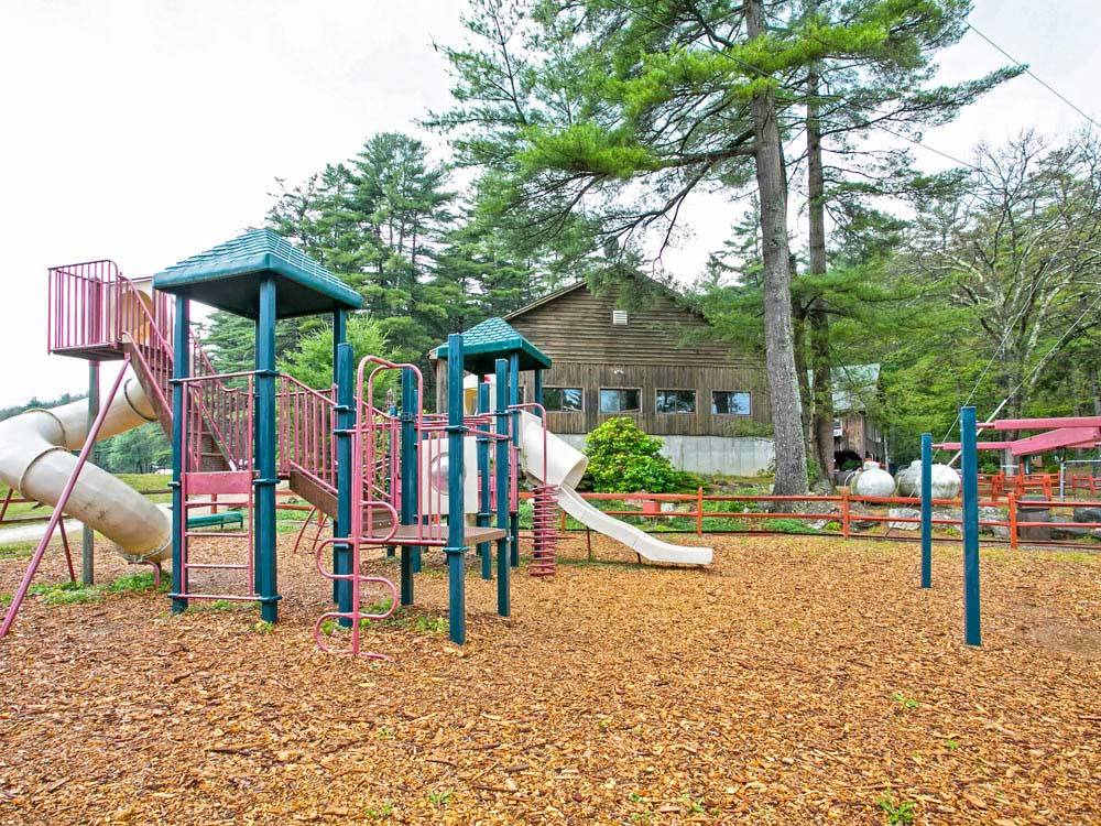 Playground in front of lodge at THOUSAND TRAILS STURBRIDGE
