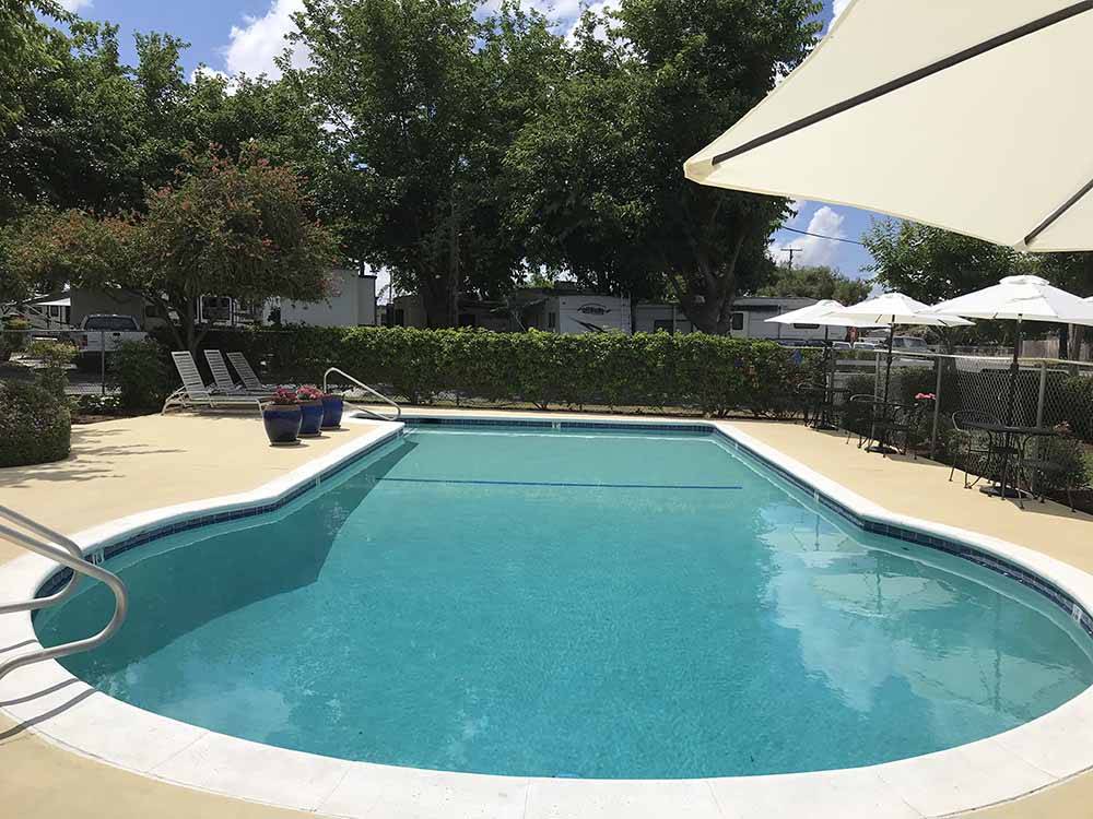 The swimming pool area at FRESNO MOBILE HOME & RV PARK