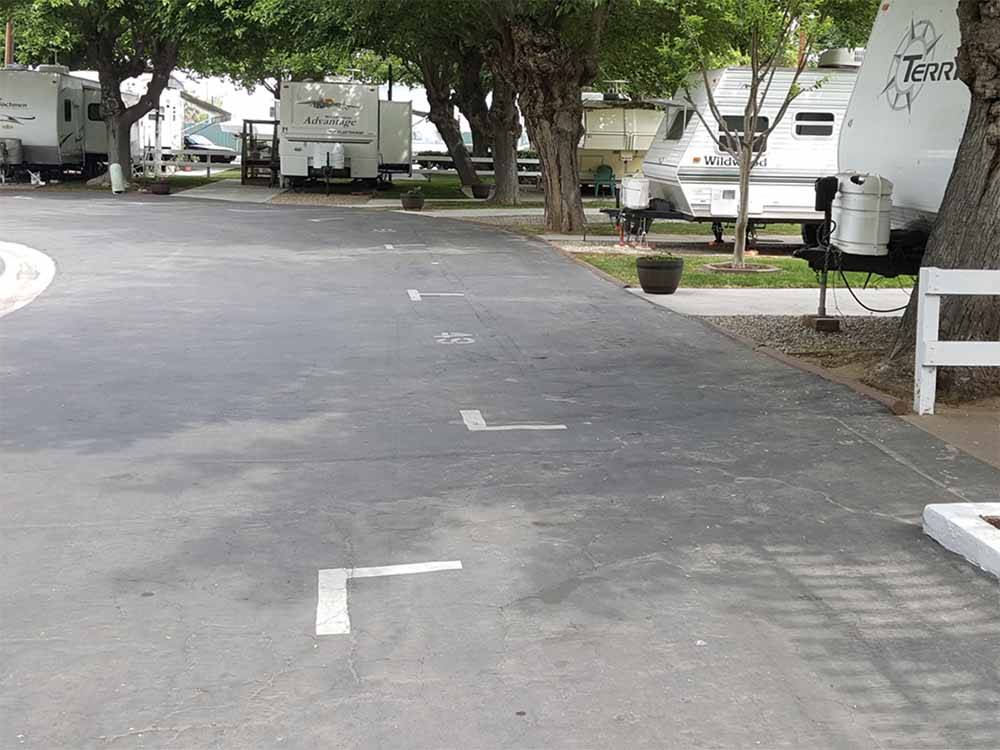 A row of parking spaces at FRESNO MOBILE HOME & RV PARK