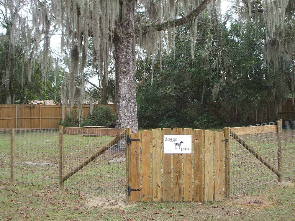 The fenced in dog park area at BELLE PARC RV RESORT