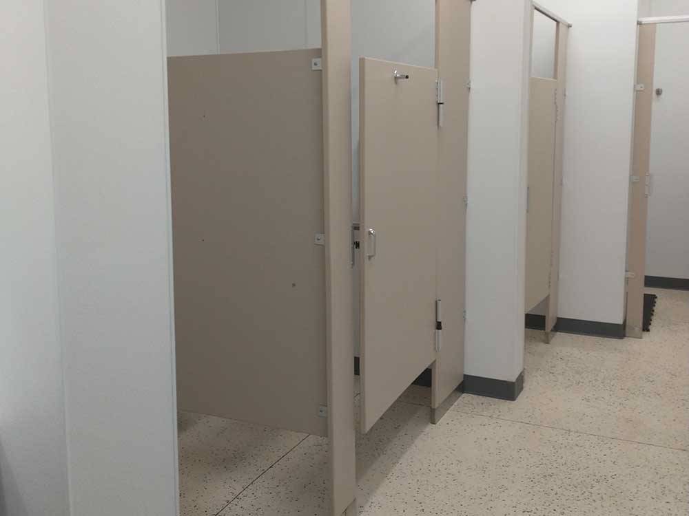 Bathroom stalls for visitors at TOWER CAMPGROUND
