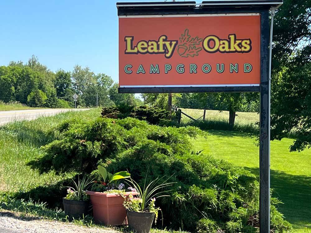 The front entrance sign at LEAFY OAKS CAMPGROUND