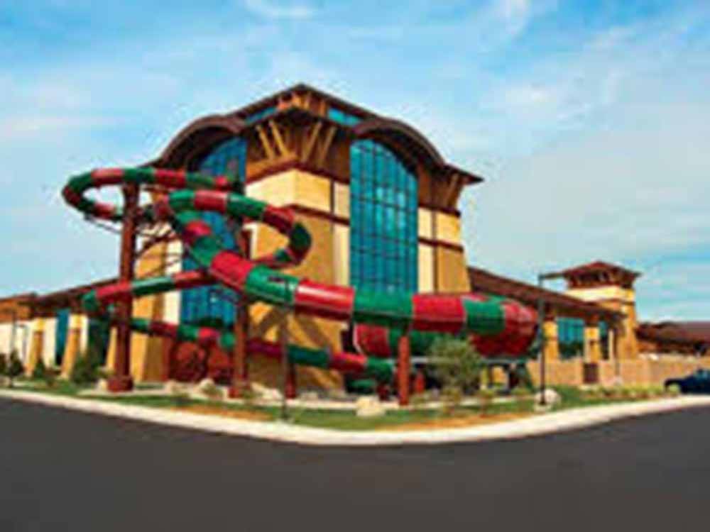 A rendering photo of a slide on the outside of a building at THE HILL CAMPGROUND