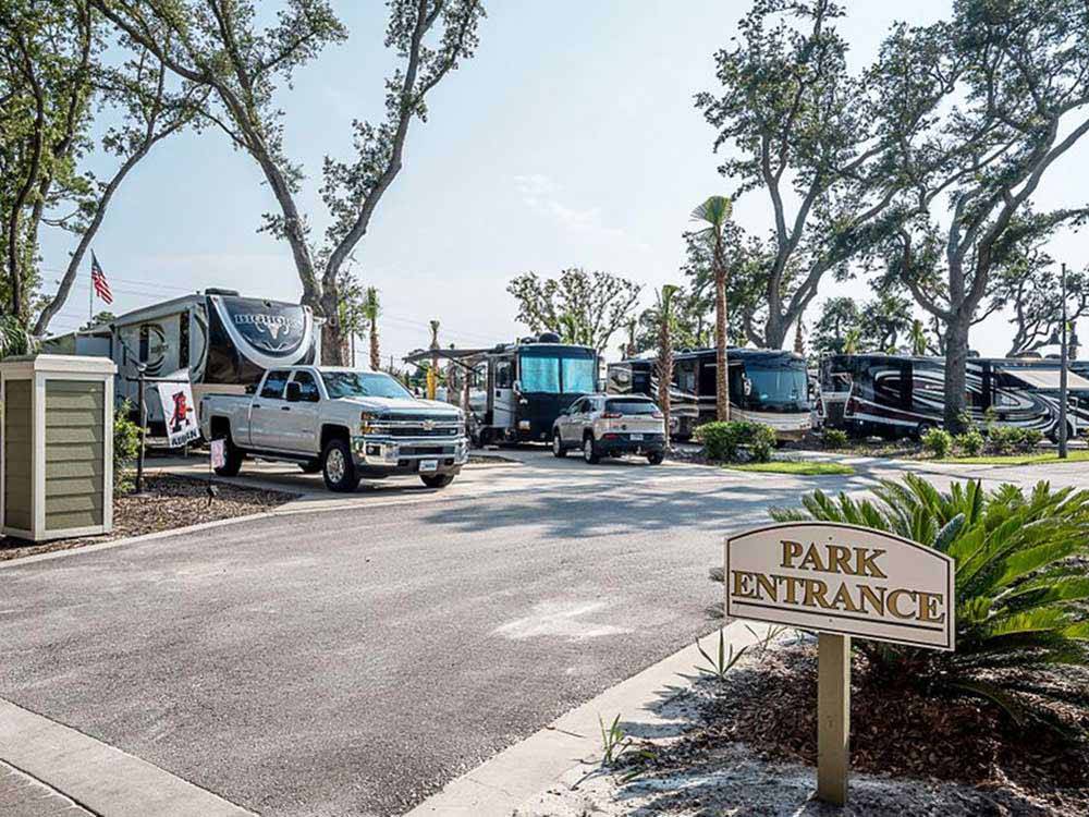 Trailers and motorhomes parked in RV sites at SANTA ROSA WATERFRONT RV RESORT