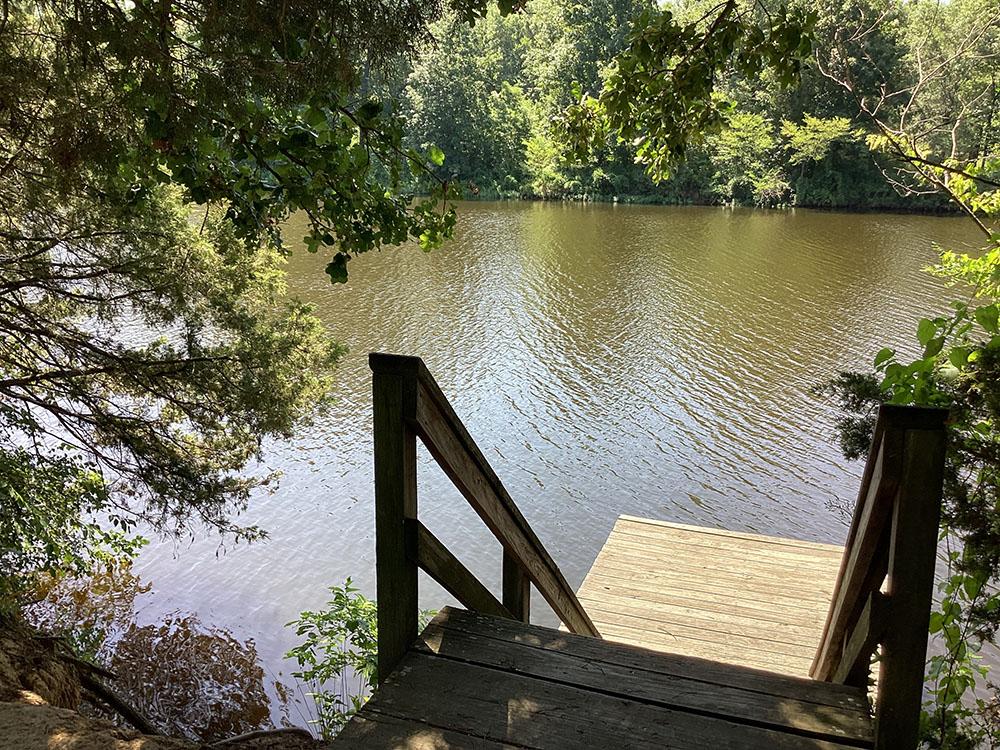 Steps down to lake at LONG LAKE RESORT & RV PARK