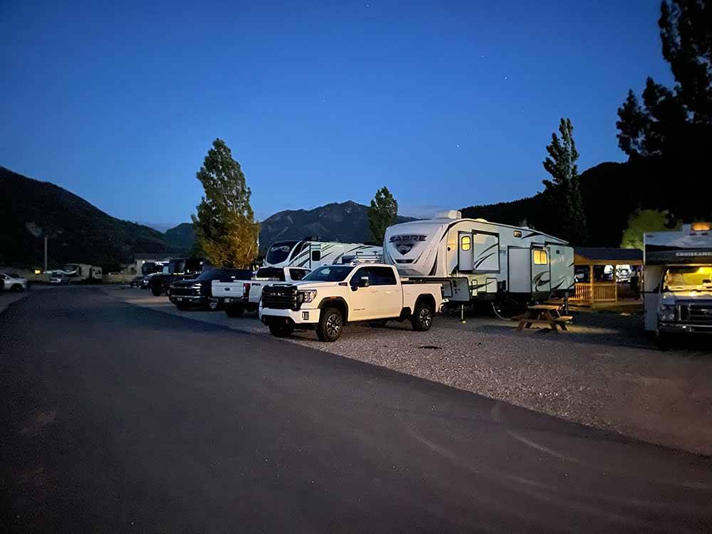 A group of filled RV sites at GREYS RIVER COVE RESORT