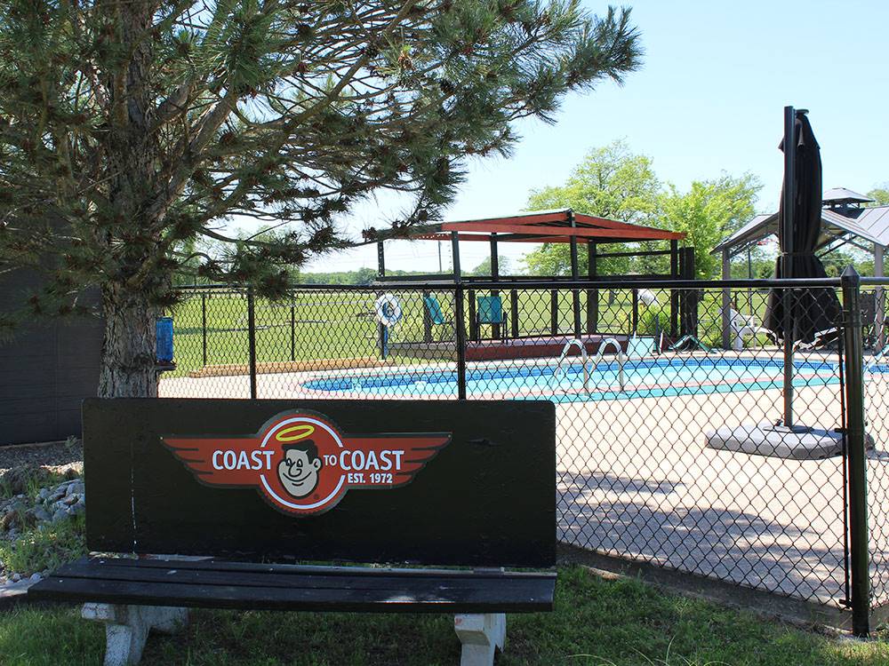 A bench near the pool area