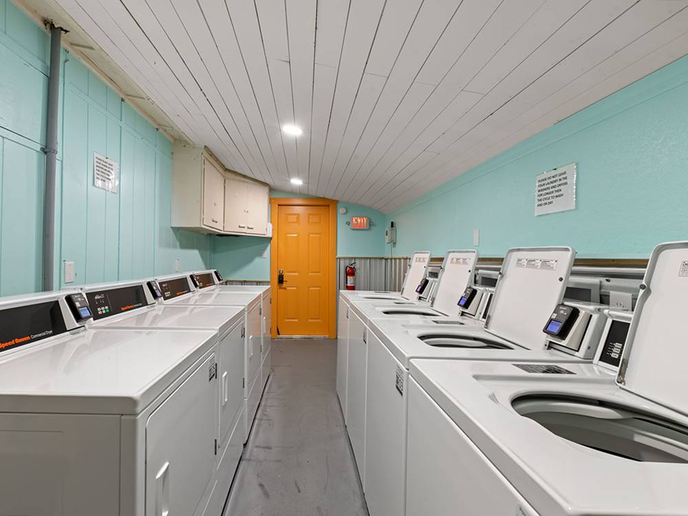 Laundry room with washers and dryers