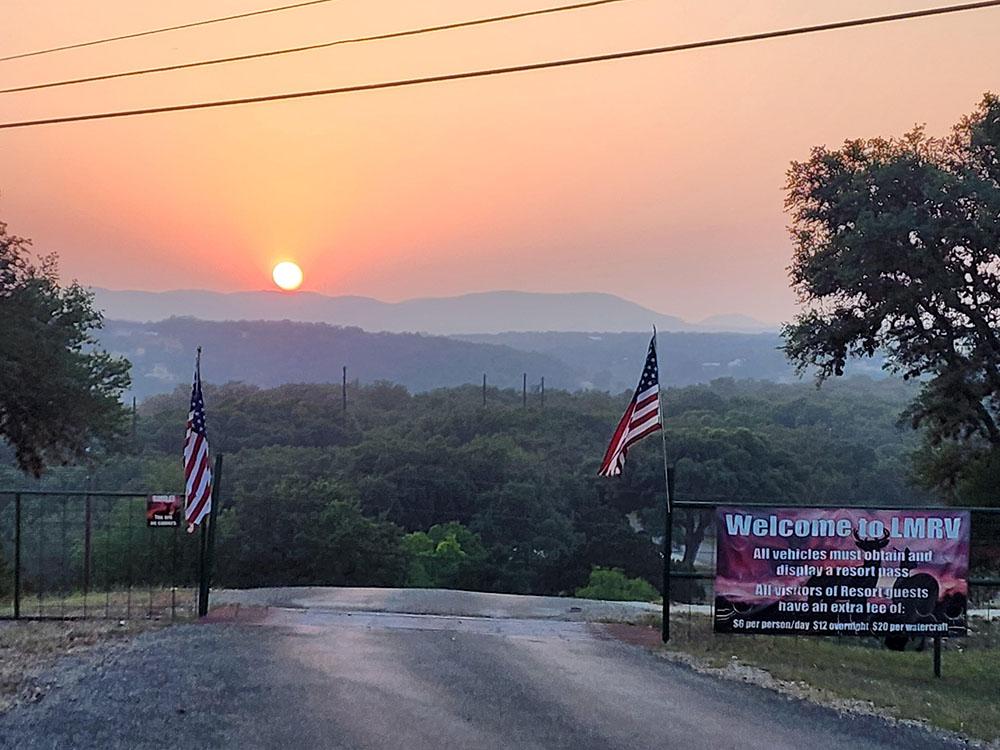 Park entrance at sunset at LAKE MEDINA RV RESORT