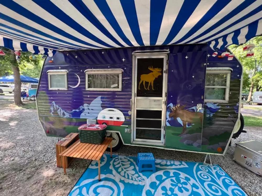 Travel trailer with moose mural at Ozark Outdoors/Riverfront Resort