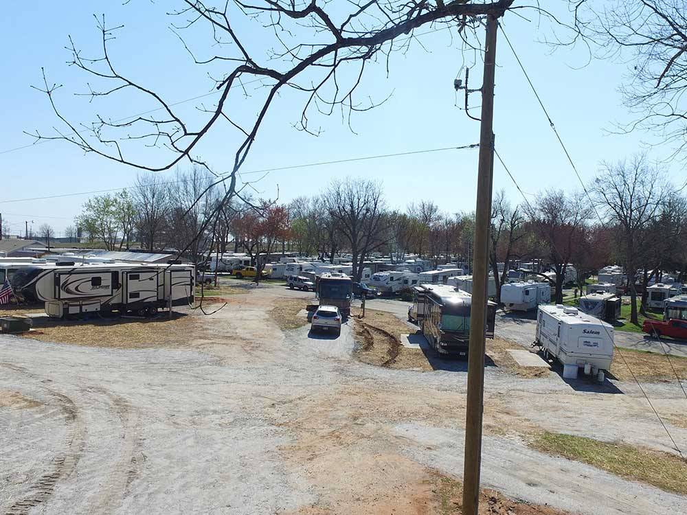 View of parked RVs in sites at SPRINGWOOD RV PARK