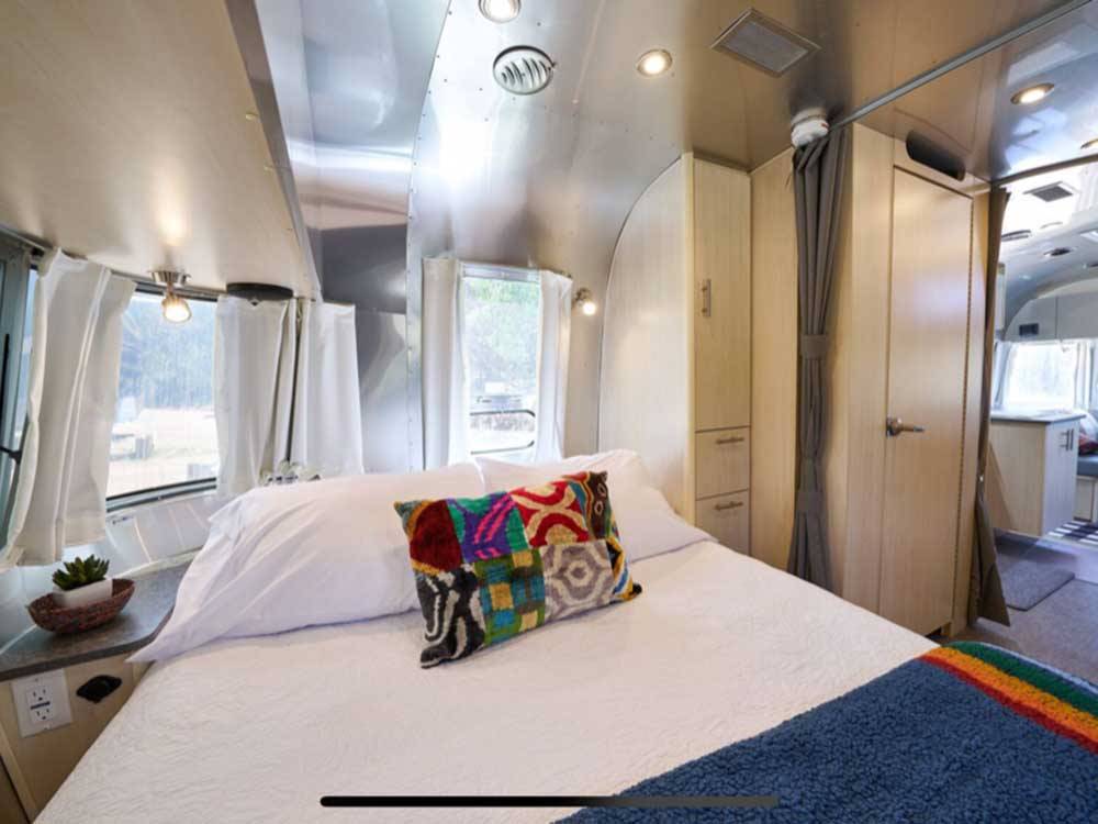 A view of the bed in the Airstream rental at HIDDEN VALLEY MOUNTAIN RESORT