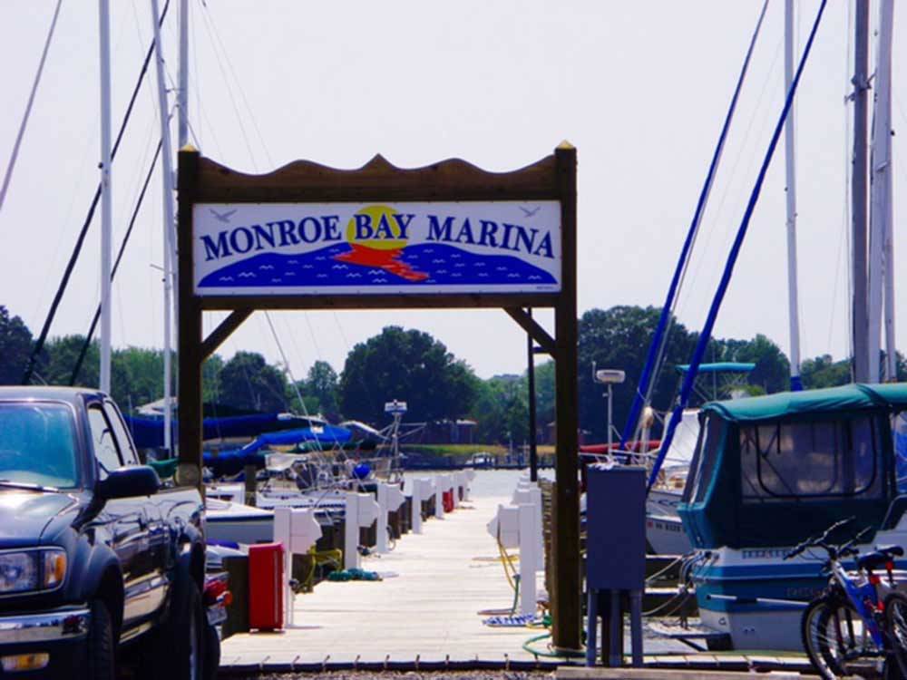 Park sign over marina dock at MONROE BAY CAMPGROUND