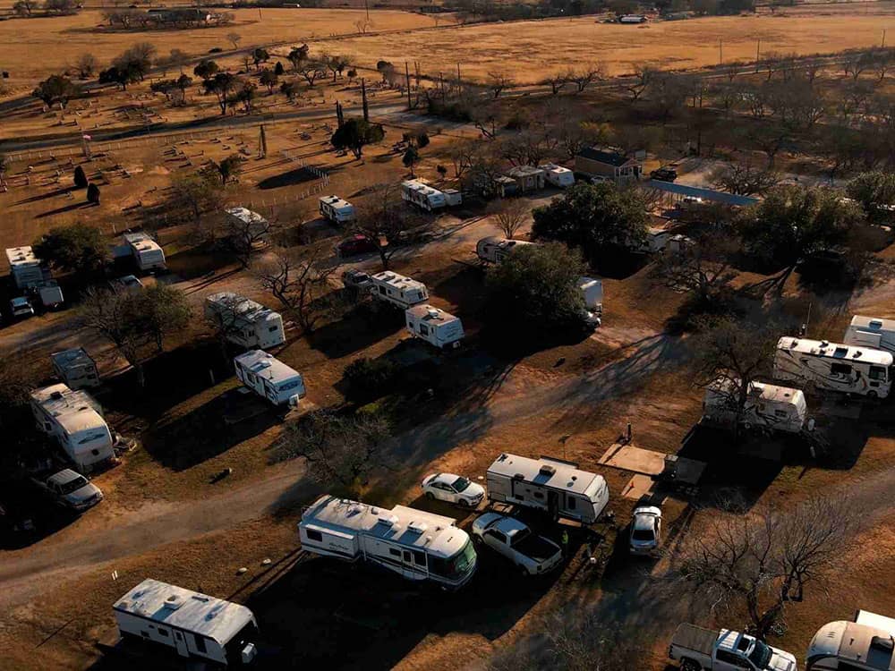 Aerial view of campground lots with RVs