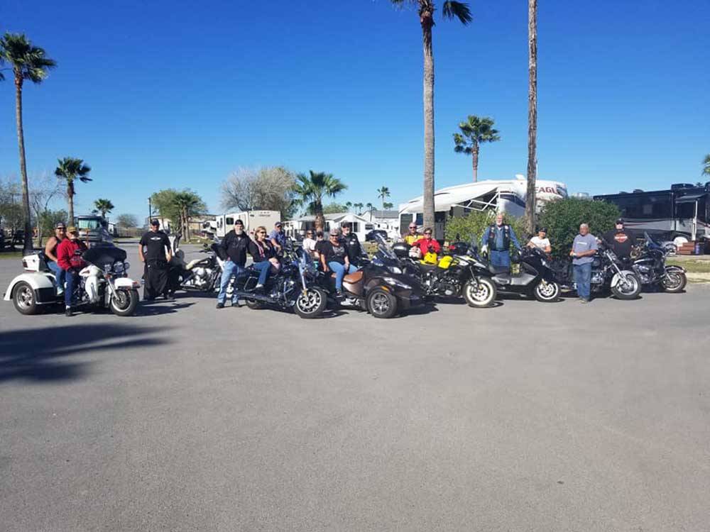 A group of motorcycles in a line at PALMDALE RV RESORT